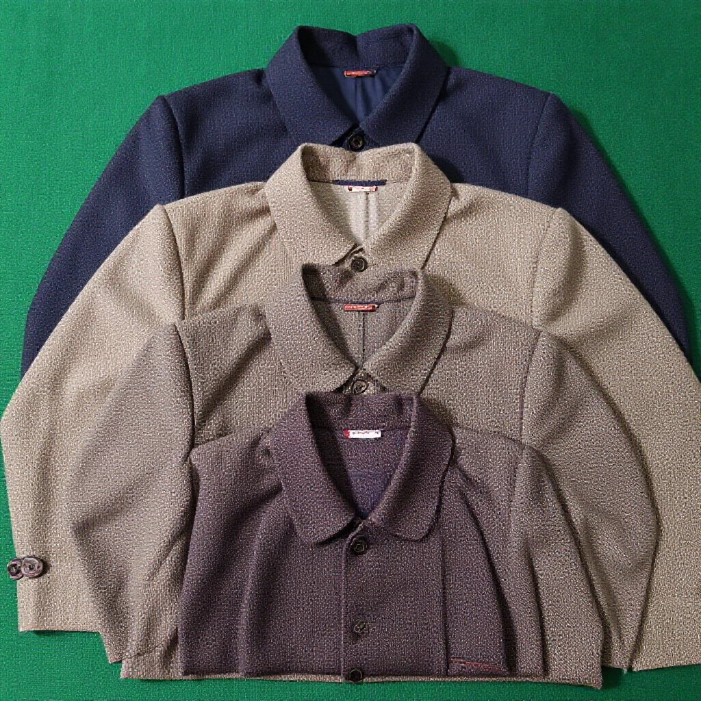 Detailed closeup of Tianjiu civilian suits arranged in size order from supreme Tian double sixes to lowest Ling Lin sixes on green baize cloth with subtle shadows emphasizing pip patterns and colors